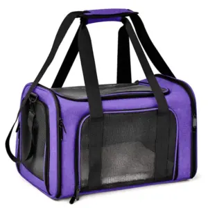 A purple pet carrier bag with black accents, featuring mesh ventilation windows, multiple black straps, and zippers, designed for pet transportation, set against a white background.