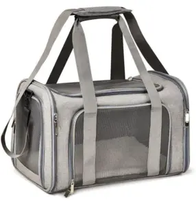 A gray pet carrier bag with matching gray straps, mesh ventilation windows, and zippers, designed for pet transportation, set against a white background.